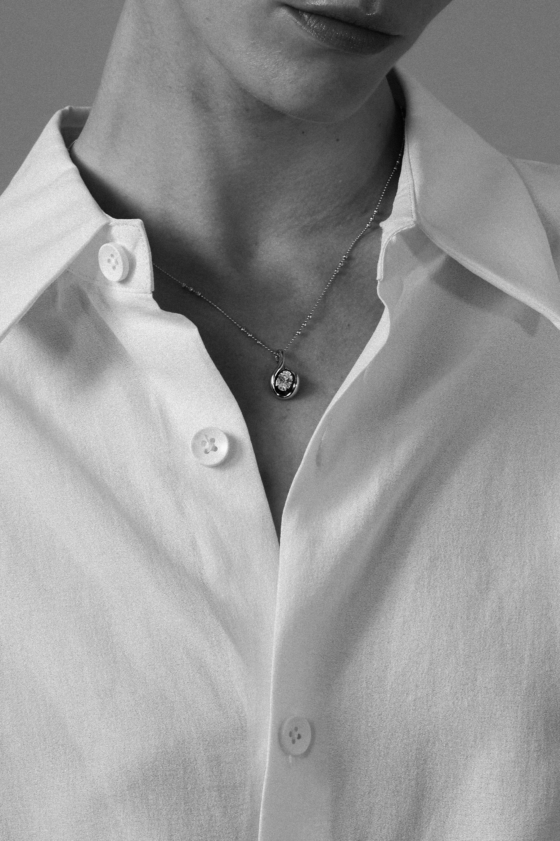 "MFE" Two-Tone Silver Quaver Pendant